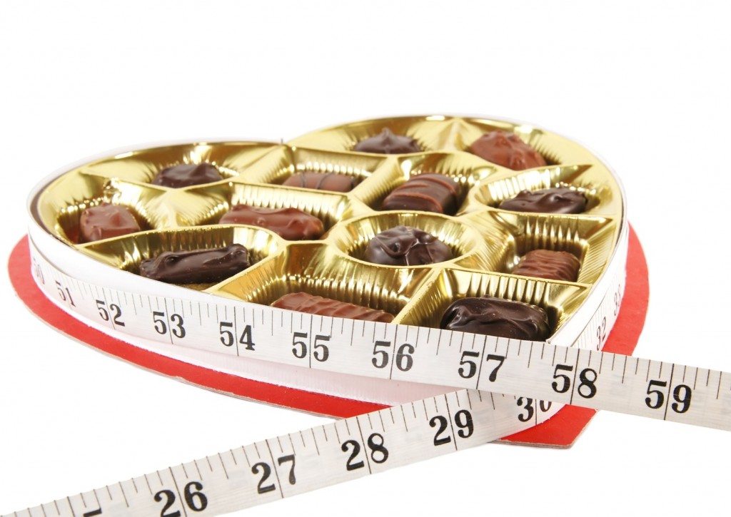 valentines candy heart box of chocolates with a tape measure