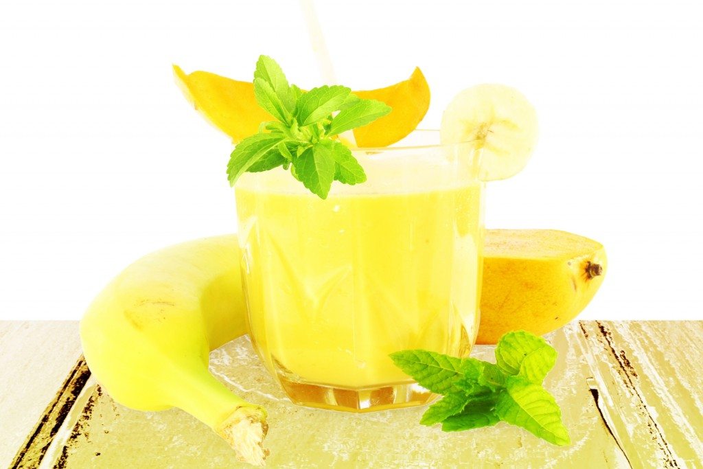 banana mango smoothie with stevia  in pure white background