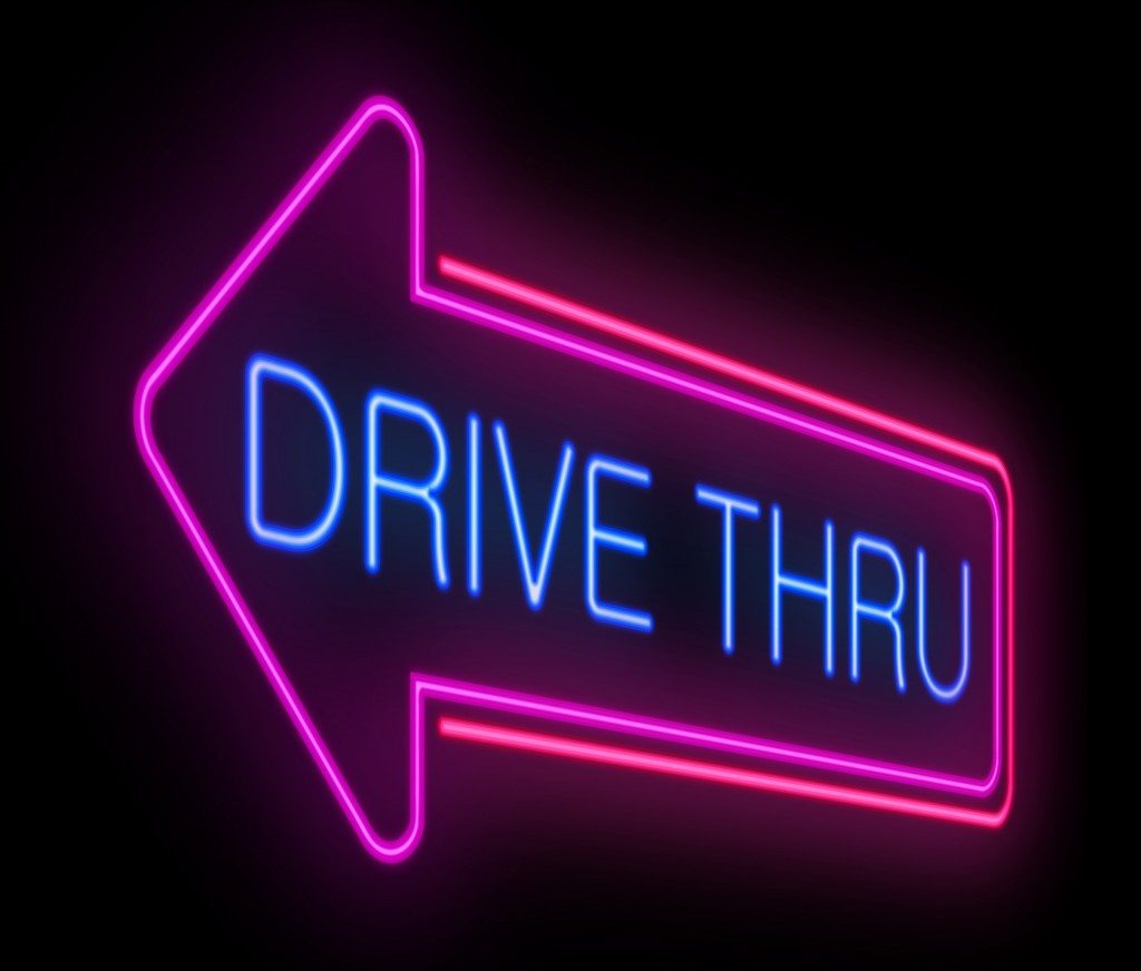 Illustration depicting an illuminated neon drive thru sign.