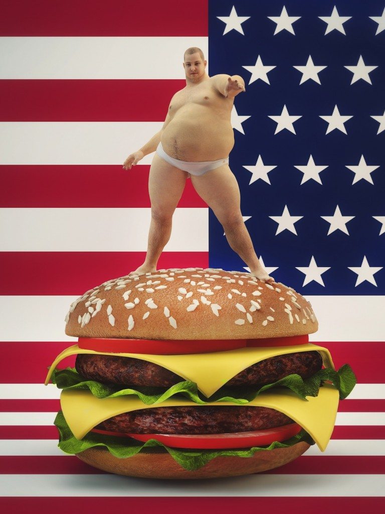 Fat man standing on a hamburger with the USA flag background.