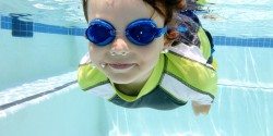 Child Swimming in Pool Underwater