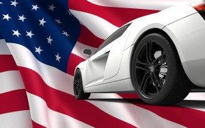 Modern white car isolated on a USA flag